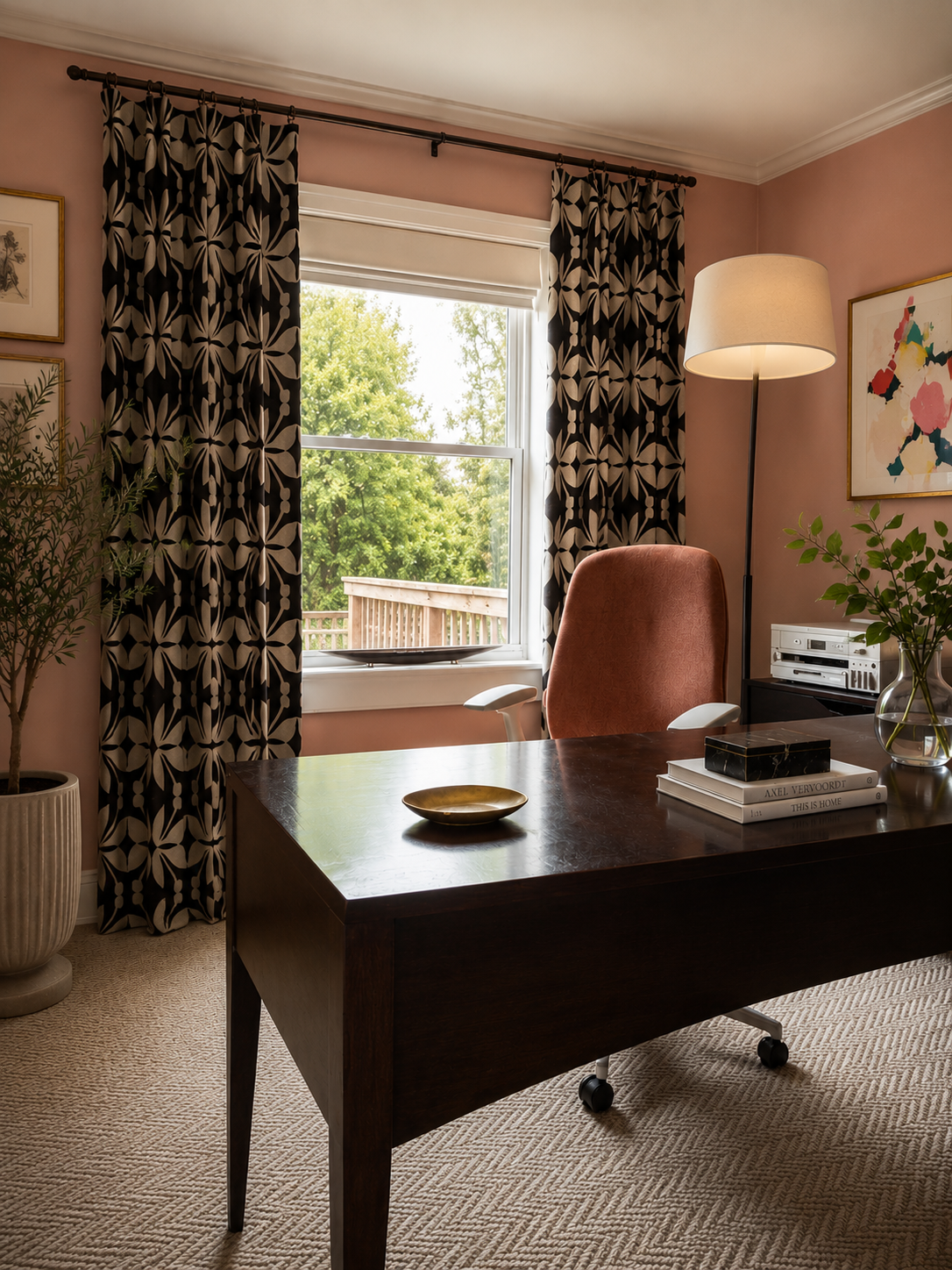 Beck Road her office — dusty rose walls, bold graphic black and cream drapery, dark walnut desk, terracotta velvet chair, abstract art